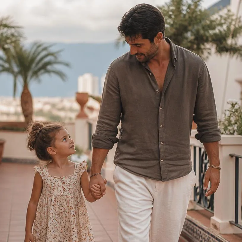 Taxation: a father and his daughter walking hand in hand